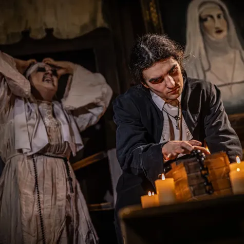 A person in a garment with a box with a person in a robe

AI-generated content may be incorrect.