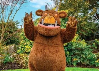The Gruffalo in a garden background