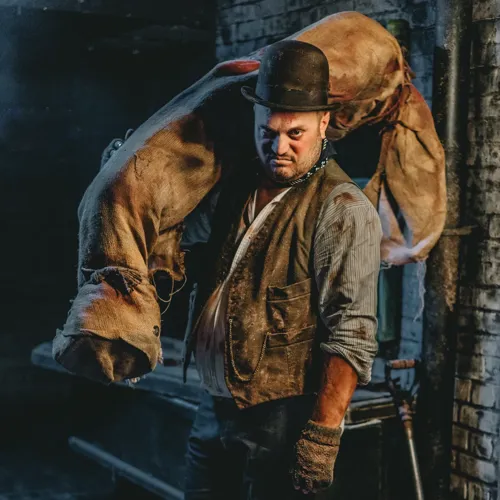 A person in a hat holding a large bag of meat

AI-generated content may be incorrect.