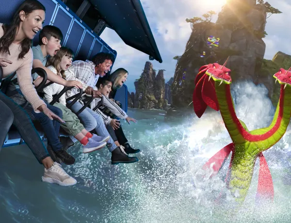 Families enjoying Flight of the Sky Lion with Duo the two-headed hydra