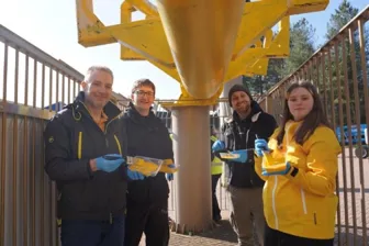 A group of people standing outside

AI-generated content may be incorrect.